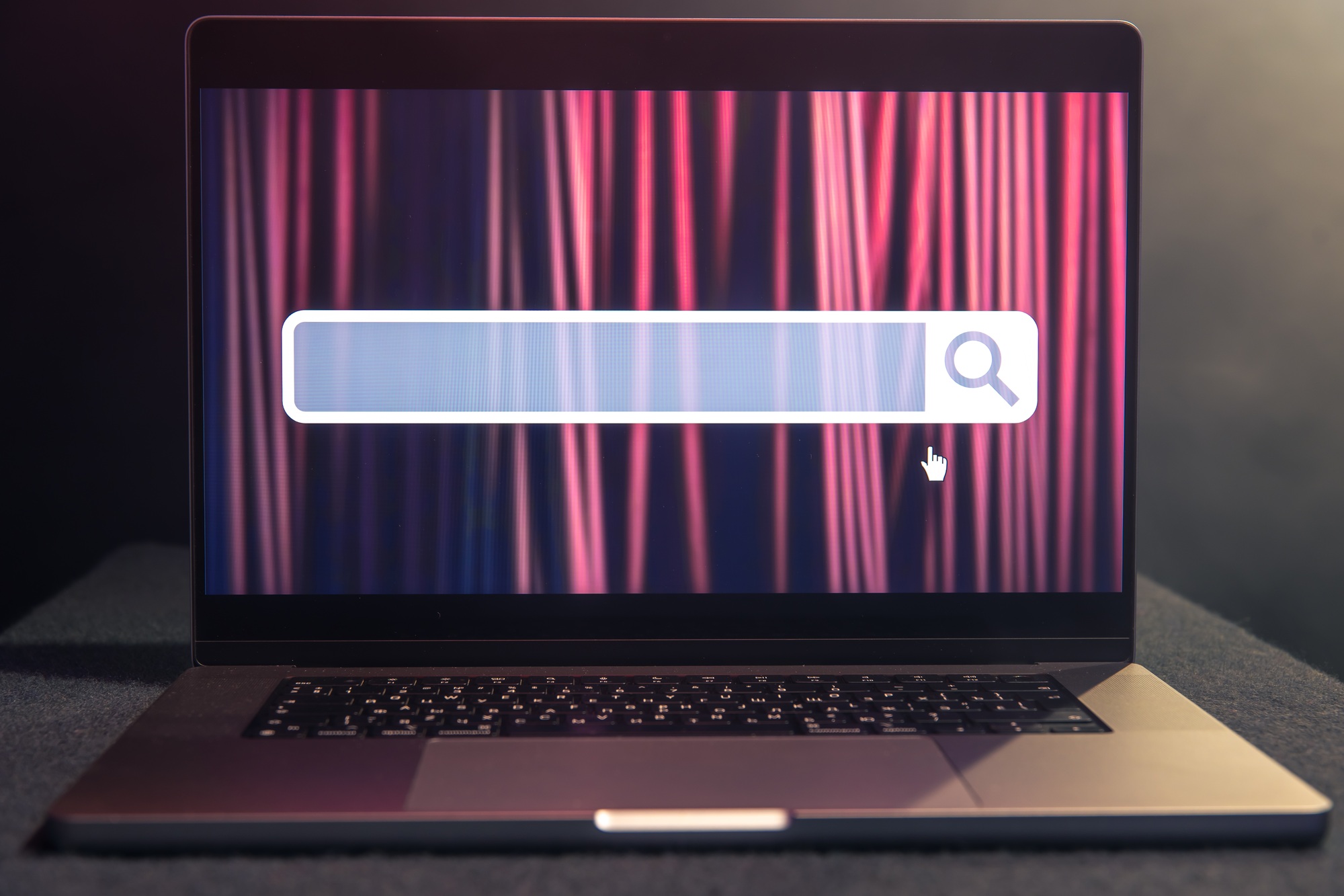 Laptop with internet browser search bar on screen.