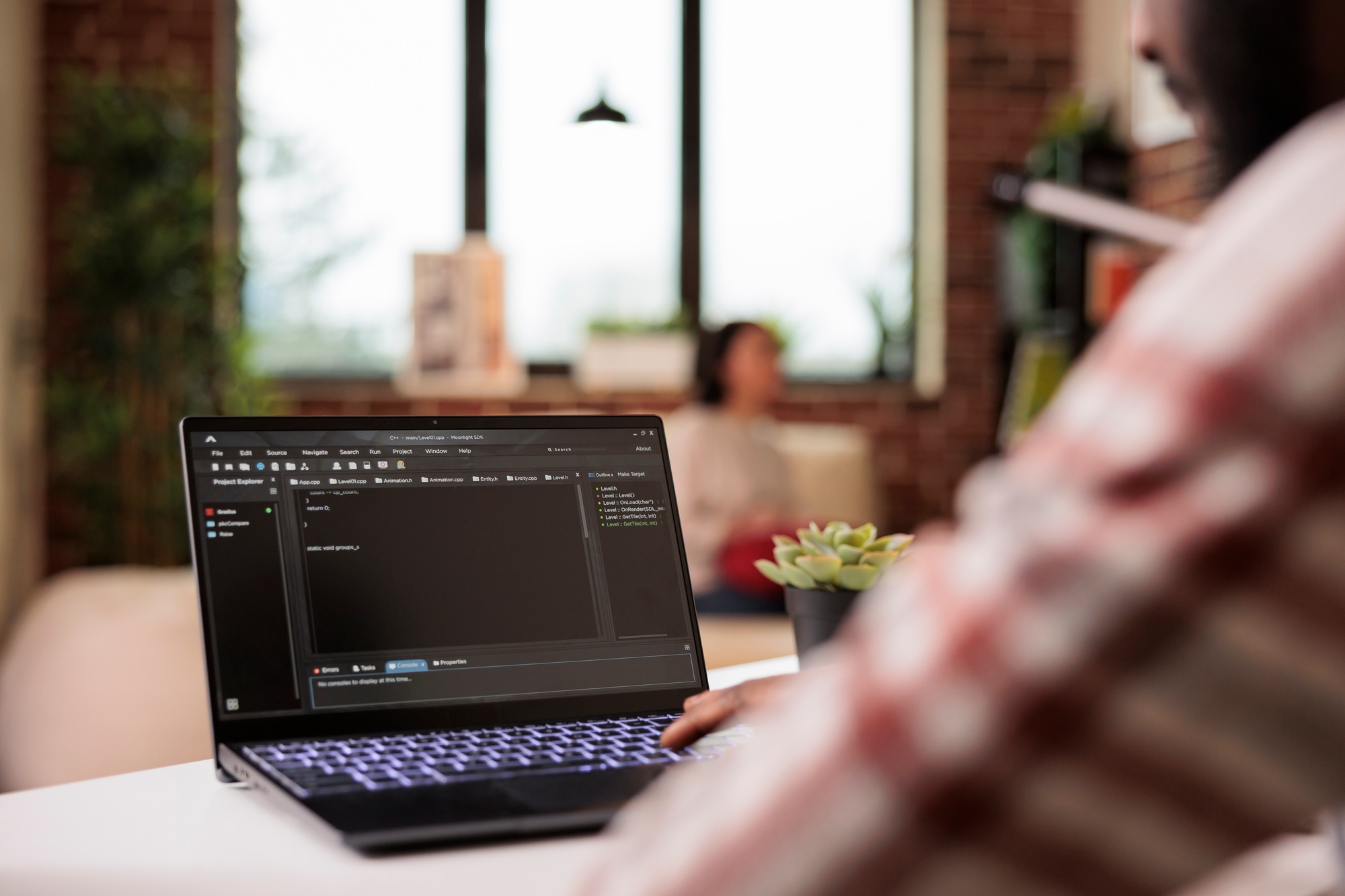 Male IT engineer programming app code